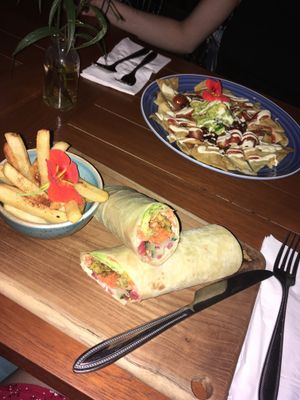 Vegan chicken sandwich (actually a wrap), and Kin Nachos: both delicious! at Kin Cafe in Seminyak