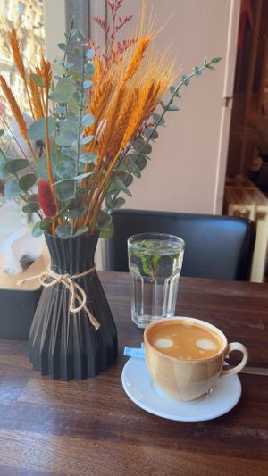 Coffee & water with a sprig of mint at Spidsroden in Copenhagen