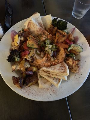 Roasted red pepper hummus with pita and roasted veggies  at Tula Kitchen in Bay Shore