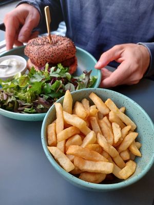 Beet burger with fries and salad at CultuurCafé de Grote Post in Oostende