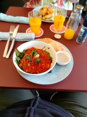 Vegan shakshuka and fresh orange juice. at CultuurCafé de Grote Post in Oostende