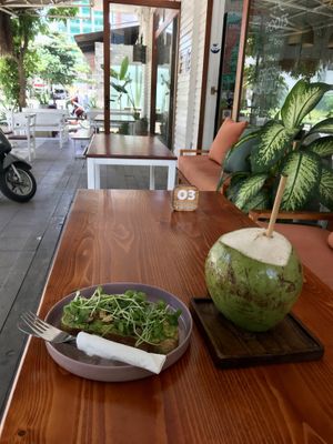 Avo toast and coconut juice  at Roots Plant-Based Cafe in Da Nang