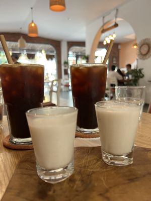 Coffees with non dairy milk   at Roots Plant-Based Cafe in Da Nang
