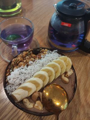 Cocoa smoothie and butterfly pea tea at Roots Plant-Based Cafe in Da Nang