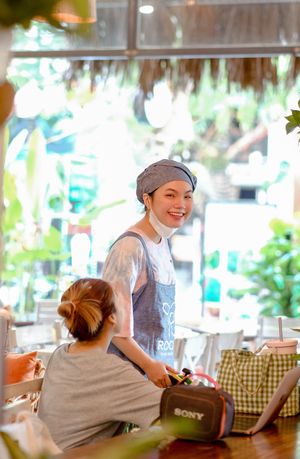 our friendly staff at Roots Plant-Based Cafe in Da Nang