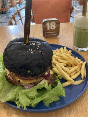 Matcha and burger   at Roots Plant-Based Cafe in Da Nang