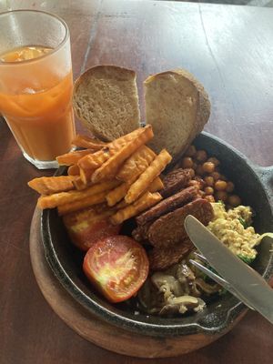 Juice and full breakfast   at Roots Plant-Based Cafe in Da Nang