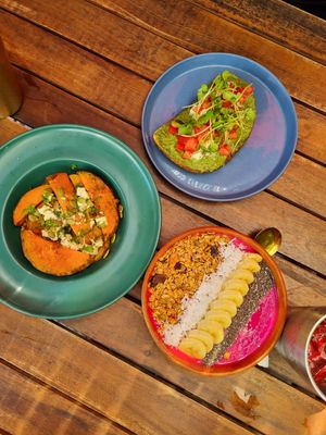 Pumpkin Wedges, basil Pesto toast, tropical smoothie bowl at Roots Plant-Based Cafe in Da Nang