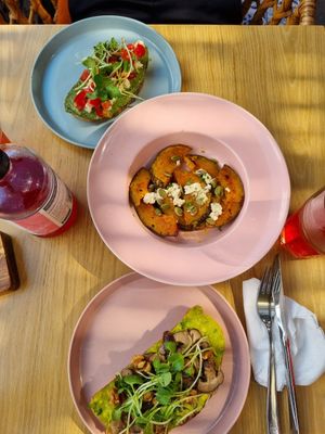 Basil Pesto Toast, pumpkin Wedges, avo and shitake toast at Roots Plant-Based Cafe in Da Nang