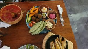 sharing platter (falafel, pita, veggies, sweet potato fries, hummus and vegan feta) at Roots Plant-Based Cafe in Da Nang