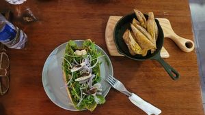 garlic bread and pesto/cheese baguette at Roots Plant-Based Cafe in Da Nang