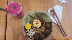 falafel bowl with dragon fruit smoothie at Roots Plant-Based Cafe in Da Nang