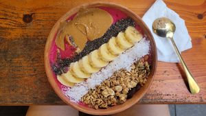 smoothie bowl with dragon fruit (and added peanut butter) at Roots Plant-Based Cafe in Da Nang