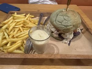 swiss cheese burger without salad  at Roots Plant-Based Cafe in Da Nang