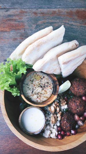 Mediterranean bowl with added pita bread... oh my the falafels.  at Roots Plant-Based Cafe in Da Nang