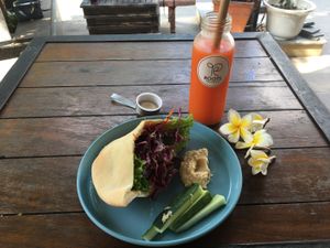 Falafel pita and toga & shine juice  at Roots Plant-Based Cafe in Da Nang