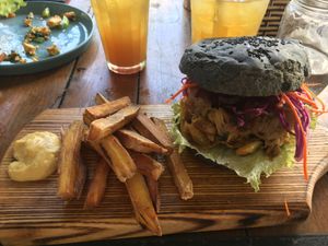 Jackfruit burger sweet potato fries  at Roots Plant-Based Cafe in Da Nang