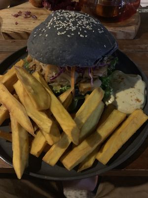 Jackfruit burger and chips at Roots Plant-Based Cafe in Da Nang