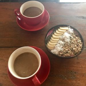 coconut milk americano + smoothie bowl = heaven at Roots Plant-Based Cafe in Da Nang