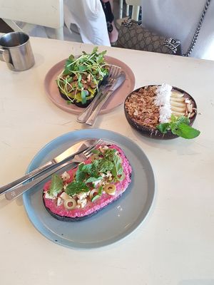 Avocado shiitake toast, beetroot hummus toast and acai bowl at Roots Plant-Based Cafe in Da Nang