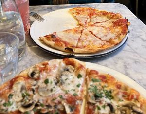 Cheese pizza & mushroom pizzaa  at Pizza Express in London