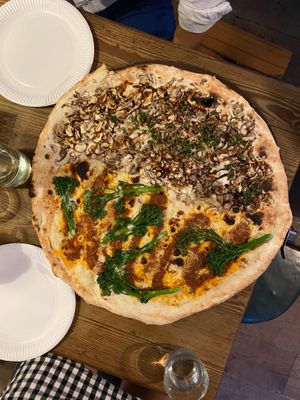 half nduja and broccoli / half mushroom and truffle glaze at Homeslice - Neal's Yard in London