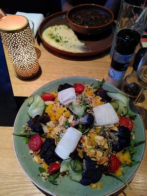 Quinoa salad and stew at Focus Eten en Drinken in Arnhem