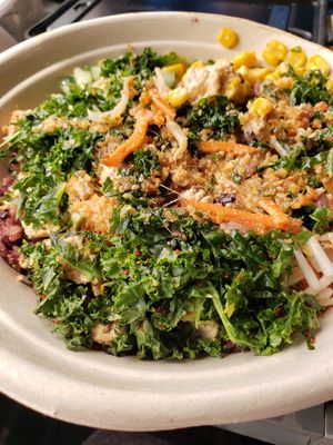 Noodle bowl with corn, cucumbers, kale, carrots and sesame seeds. Carrot ginger dressing. at Seoul Spice in Washington
