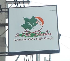 Street sign at A Pot Shabu in Pattaya