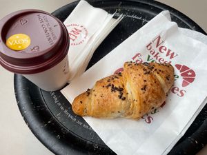 Soy flat white and chocolate croissant   at Pret A Manger - Exmouth Market in London