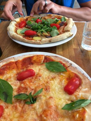 Gluten-free margarita pizza and regular crust potato pizza  at Plads'n in Copenhagen