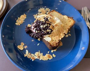 Brioche with almond cream and seasonal jelly: nice textures and not too sweet  at Rabarber in Utrecht