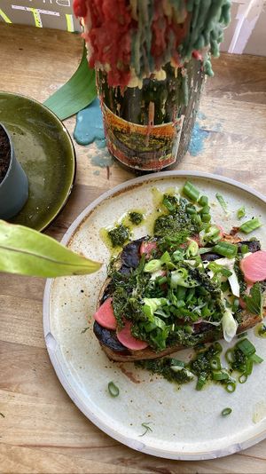 Eggplant French toast: thick slab of bread topped with some amazing grilled eggplant, tahini, herbs etc. Super yummy  at Rabarber in Utrecht