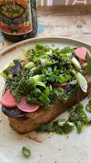 Eggplant French toast: thick slab of bread topped with some amazing grilled eggplant, tahini, herbs etc. Super yummy  at Rabarber in Utrecht