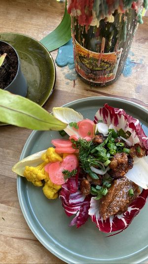 Homemade tempeh with tamarind chutney and pickled veggies: can a dish be more balanced and perfect?   at Rabarber in Utrecht