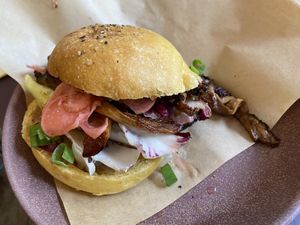 Pumpkin bun with marinated oyster mushrooms: very good, but it’s a bit better with tempeh  at Rabarber in Utrecht