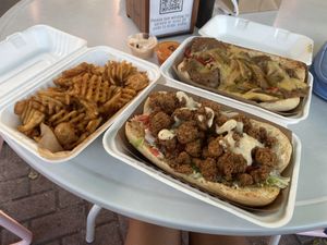 Po boy + cheese stake  at Golden Dinosaurs in Gulfport