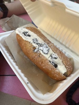 We got the Cuban and dill chick pea sandwich’s. Both were delicious. Forgot to take a pic because we were so excited. This is the cookies and cream donut which was soooo good!   at Golden Dinosaurs in Gulfport