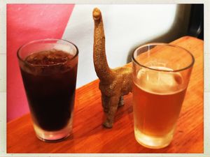 Iced coffee and a beer at Golden Dinosaurs in Gulfport