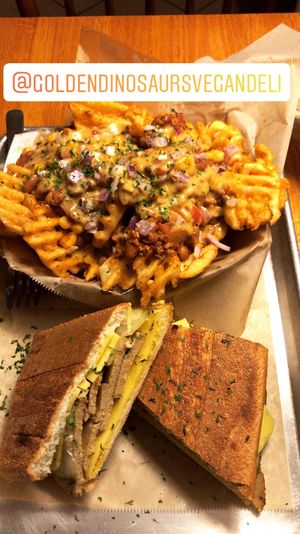 Cuban with cheese fries  at Golden Dinosaurs in Gulfport