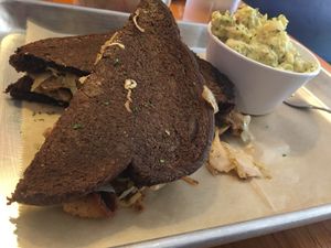 Pastrami Reuben with Potato Salad at Golden Dinosaurs in Gulfport
