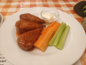 Vegan buffalo wings and crudites - the "bone" is a wooden stick!! Super cool #Veganuary at News Cafe in Tokyo