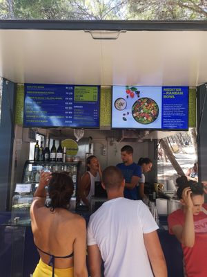 Happy staff at BioMania Street Food in Bol