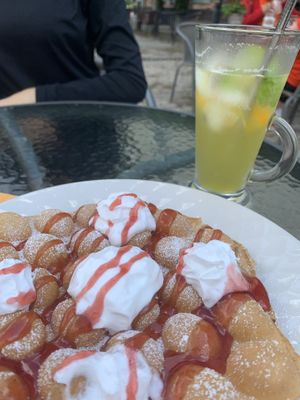 Vegan waffle with strawberry sauce & whipped cream at Cafe Nisse in Imatra