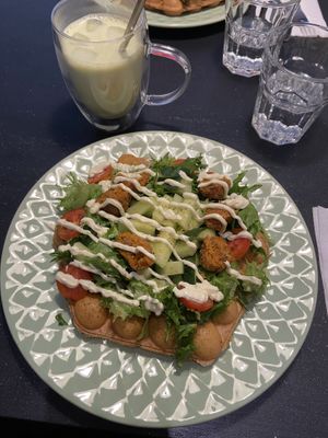 Falafel bubble waffle and iced matcha latte (with oat milk)  at Cafe Nisse in Imatra