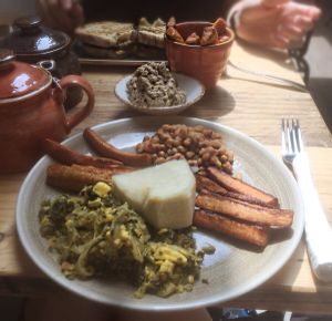 Vegan brunch , Black chickpea hummus , vegan toastie, chai (with oat milk )  at Luca's Kitchen and Bakery  in South East London