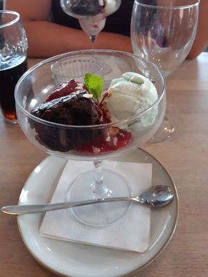 Brownie with ice cream and rashberry sauce at Miss Dot in Hals