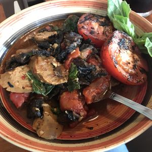 Vegan sausage mushroom eggplant tomato dish at DeepWater Brewing Company in Blue Hill