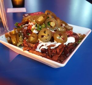 Poutine with pulled Seitan and Jalapeños at Neue Republik Reger in Berlin