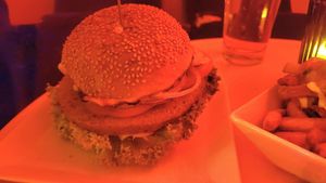 Cheesy burger (sorry red lights) at Neue Republik Reger in Berlin